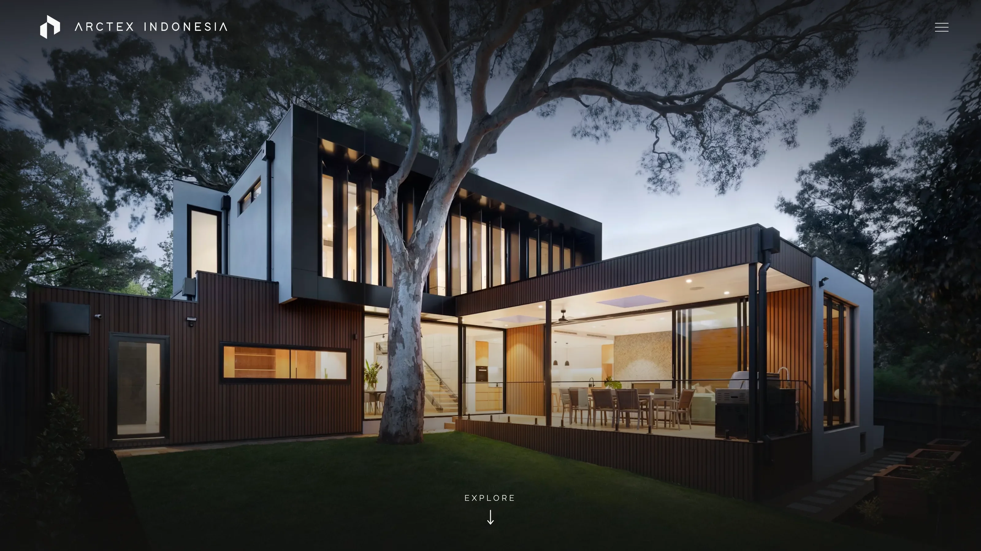 Arctex Indonesia homepage with a full-screen architectural photograph of a contemporary home.